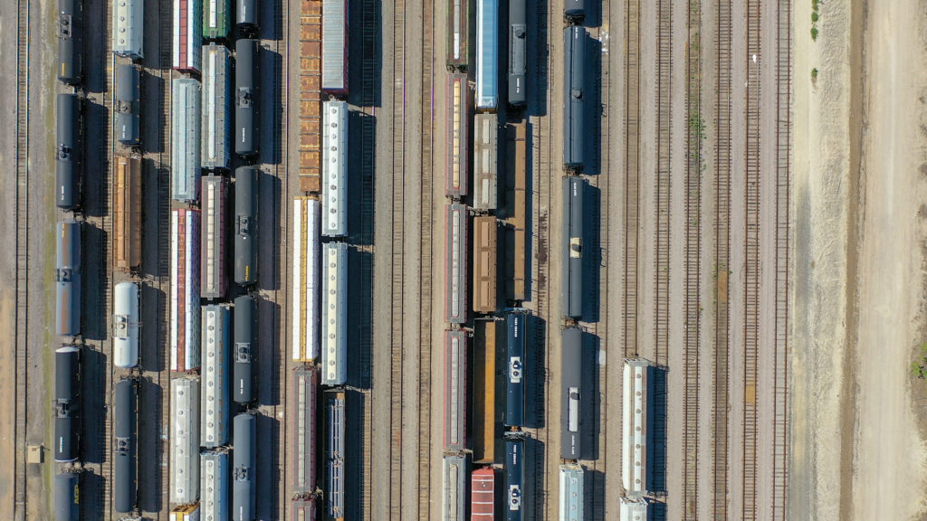 An aerial view of railways and train cars in Temple, TX