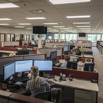 People working at cubicles in a Temple, Texas office