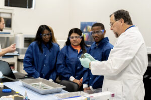 Doctor teaching students in a lab at Temple Health and Bioscience District